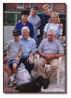 Andy with his family and grandfather on Father's Day 1997