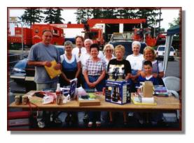Group photo of the volunteers at the Gananoque A&P 1999 BBQ Fundraiser